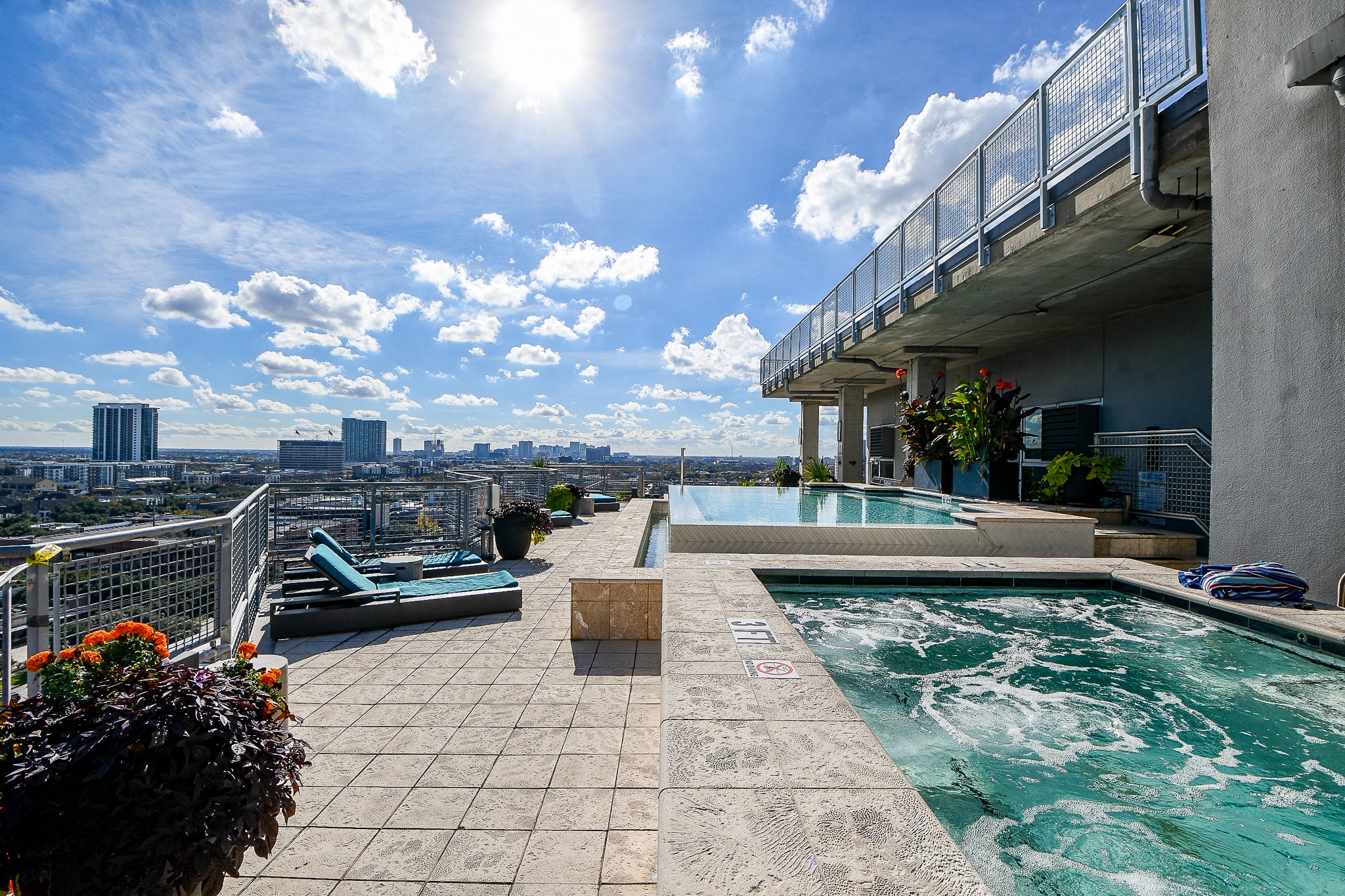 2000 Bagby Street, Unit 5441 Houston, TX 77002 - Photo 3 of 34 a view of a patio with couches table and chairs and potted plants
