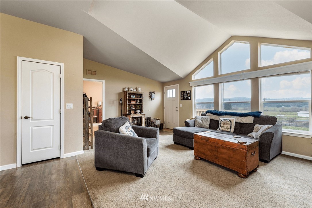 206 Senn Road Chehalis, WA 98532 - Photo 3 of 27 a living room with furniture and large windows