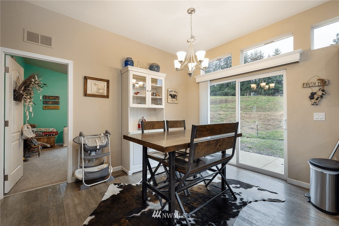206 Senn Road Chehalis, WA 98532 - Photo 8 of 27 a view of a dining room with furniture window and outside view