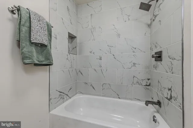 a bathroom with a bathtub