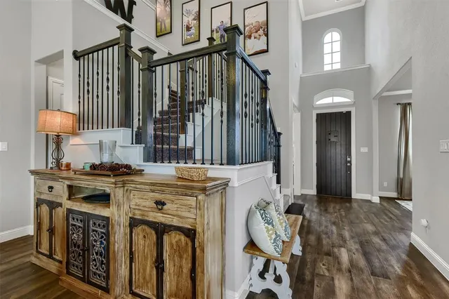 a view of a kitchen with stove and cabinets