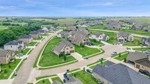 an aerial view of a house with a garden