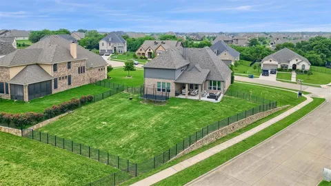 a view of house with garden space and street view