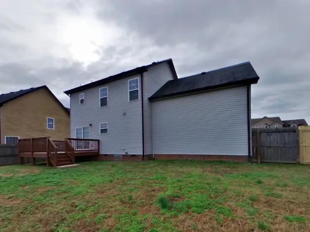 a house view with a garden space