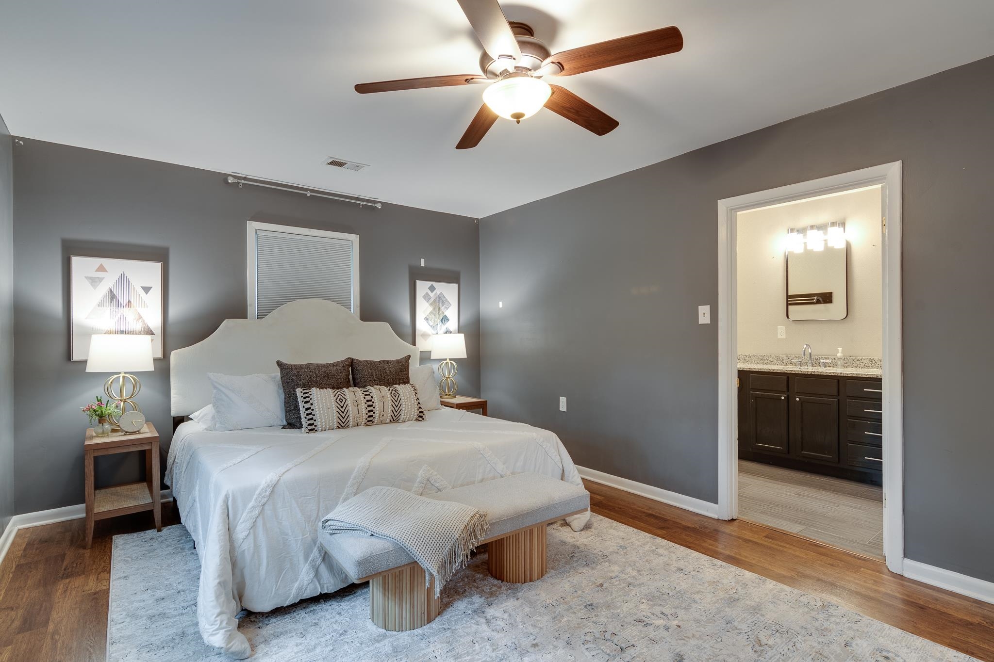 524 Alexander Street Memphis, TN 38111 - Photo 23 of 34 Bedroom with ceiling fan, sink, ensuite bathroom, and light hardwood / wood-style floors