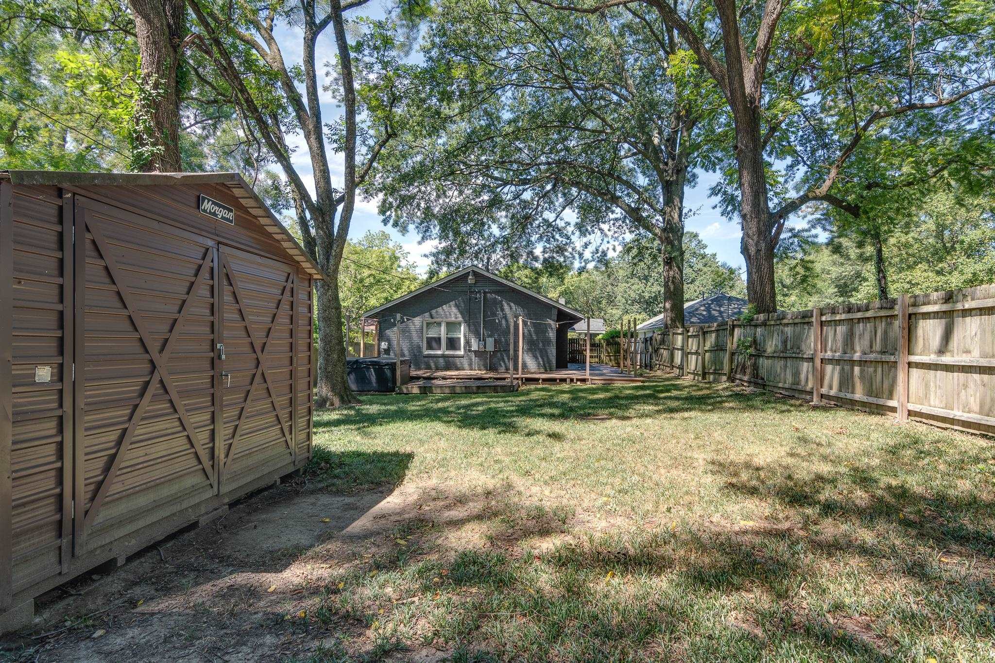 524 Alexander Street Memphis, TN 38111 - Photo 34 of 34 View of yard featuring a shed