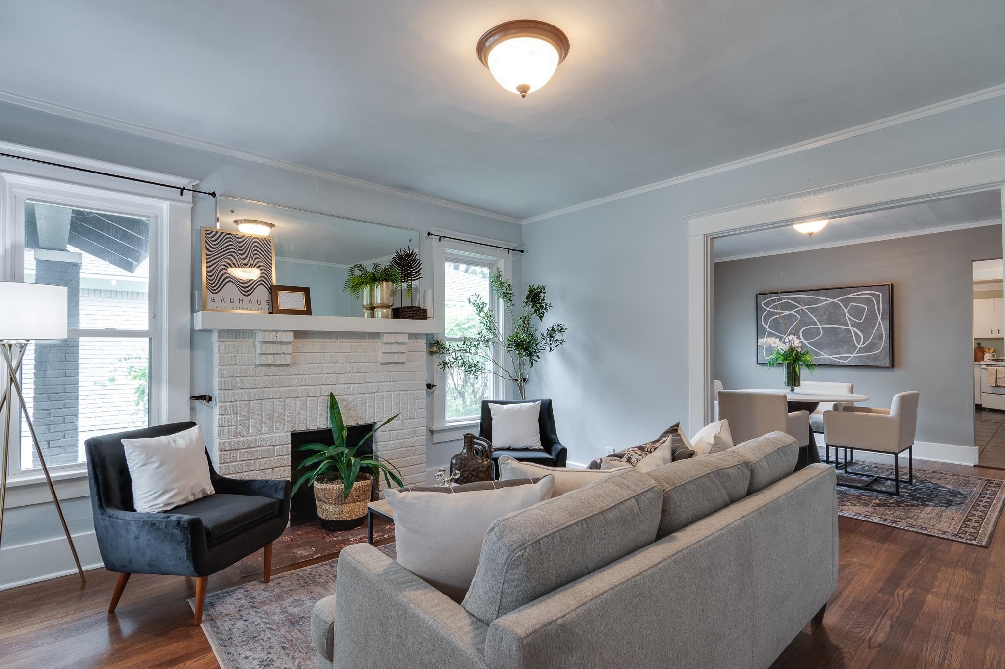 524 Alexander Street Memphis, TN 38111 - Photo 4 of 34 Living room with a fireplace, dark hardwood / wood-style floors, and crown molding
