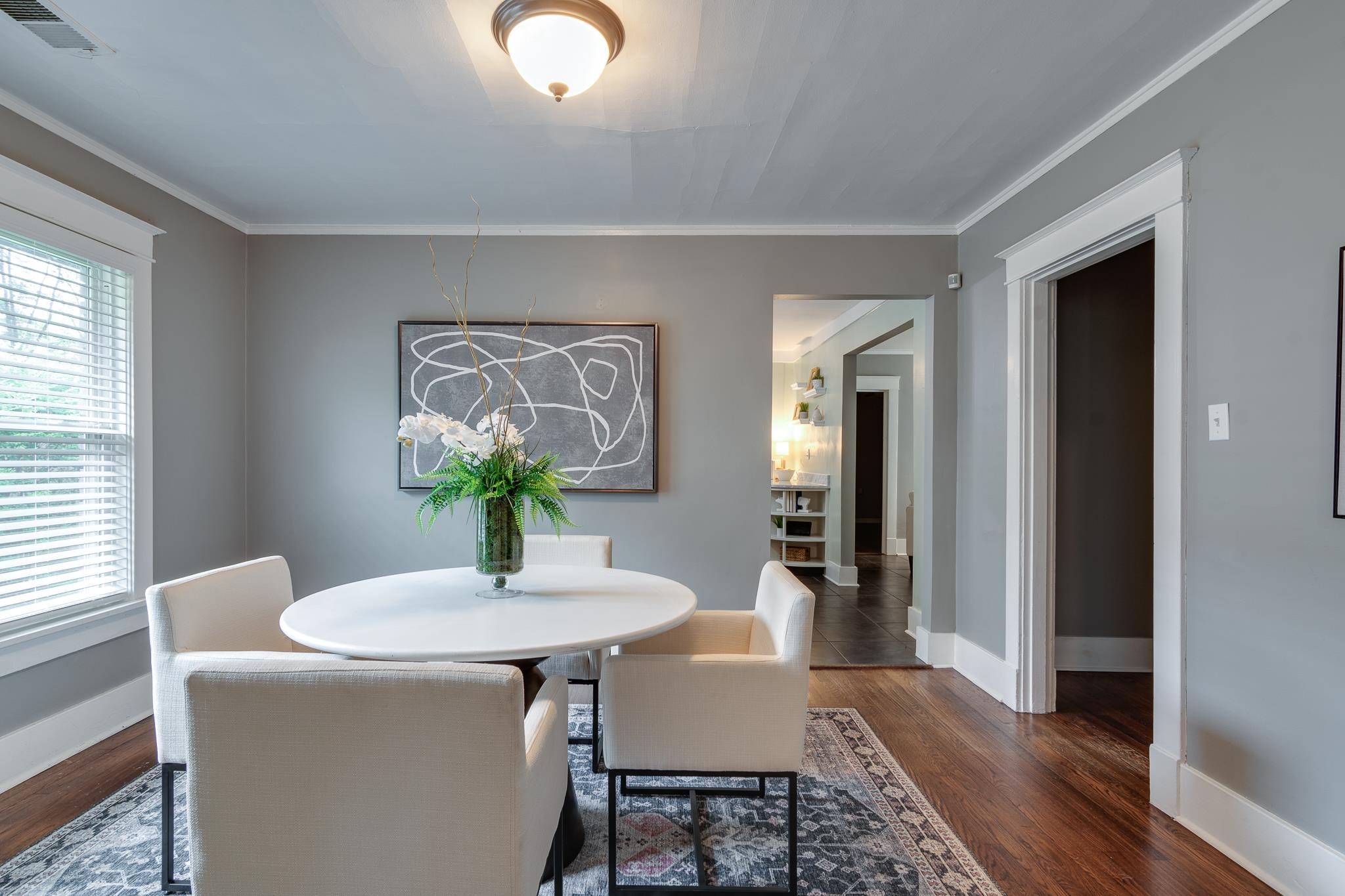 524 Alexander Street Memphis, TN 38111 - Photo 9 of 34 Dining area with crown molding and dark wood-type flooring