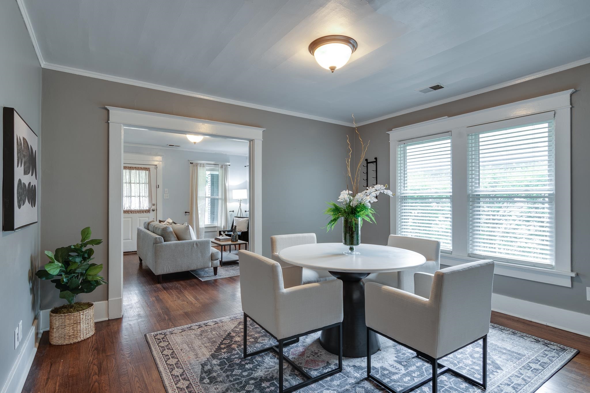 524 Alexander Street Memphis, TN 38111 - Photo 10 of 34 Dining area with plenty of natural light, ornamental molding, and dark hardwood / wood-style flooring