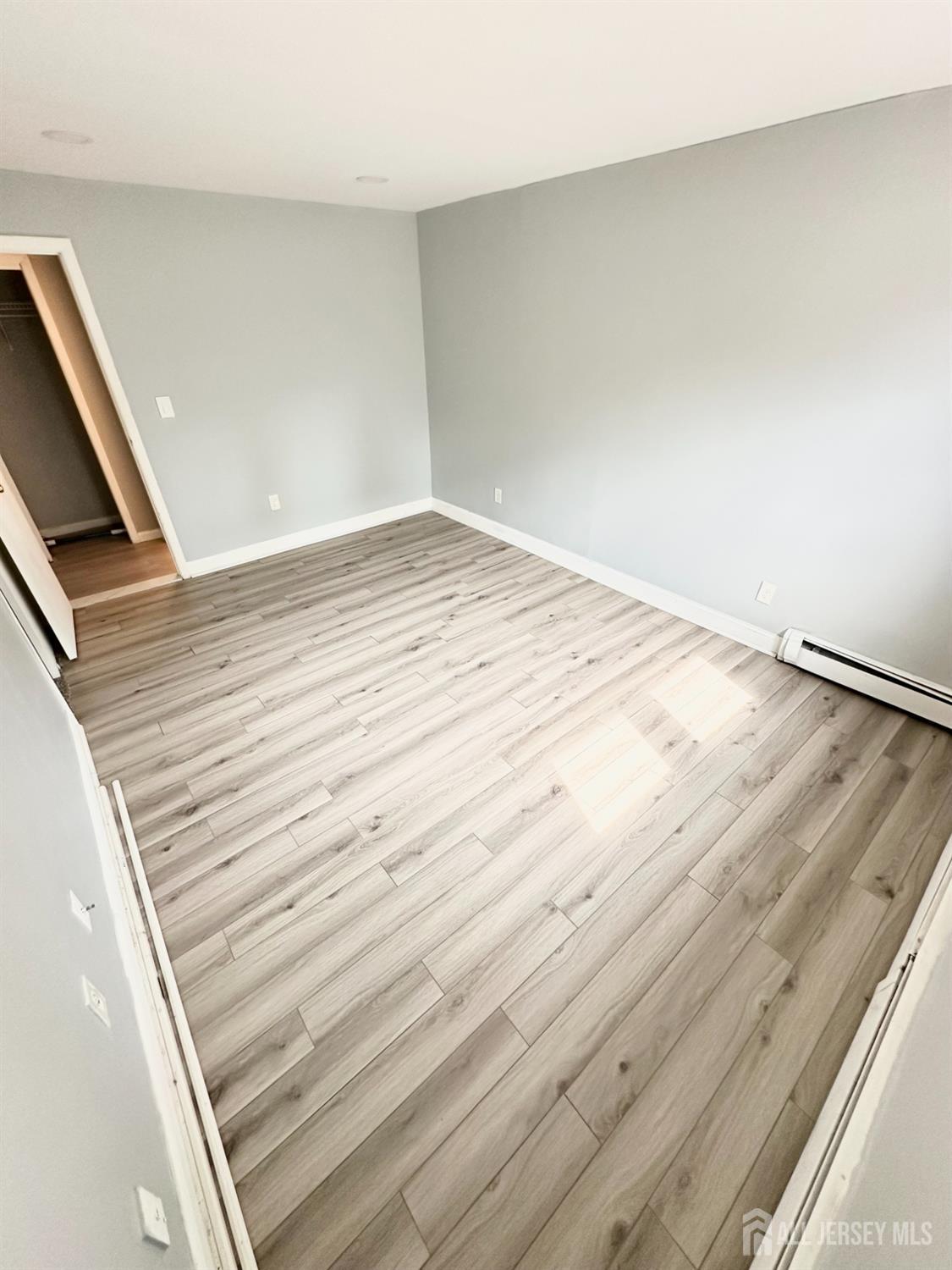 1604 74th Street, Unit B4 North Bergen, NJ 07047 - Photo 11 of 15 a view of wooden floor and staircase