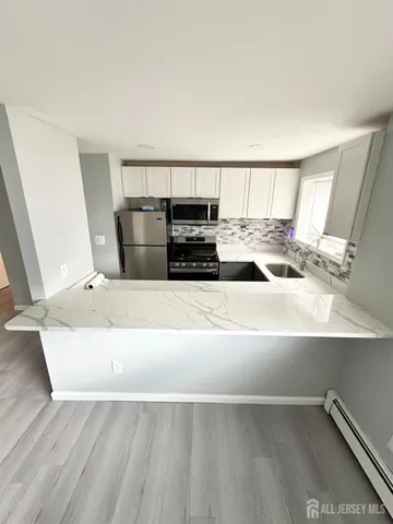 a living room with a couch and a table