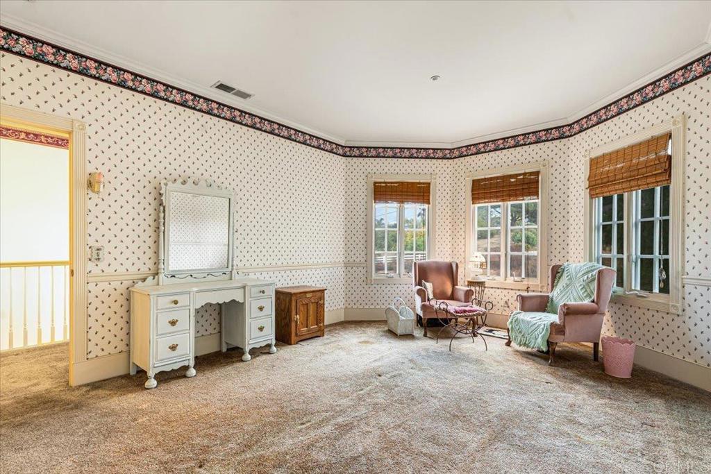 333 Salmon Road Ramona, CA 92065 - Photo 20 of 44 a living room with furniture and fireplace