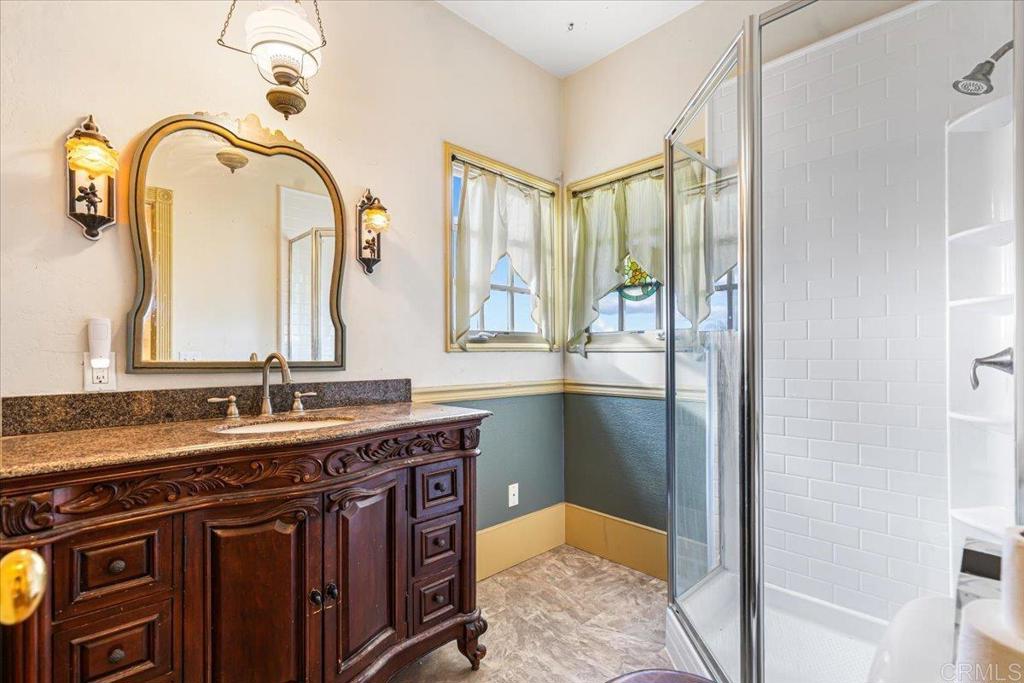 333 Salmon Road Ramona, CA 92065 - Photo 21 of 44 a bathroom with a sink and a mirror