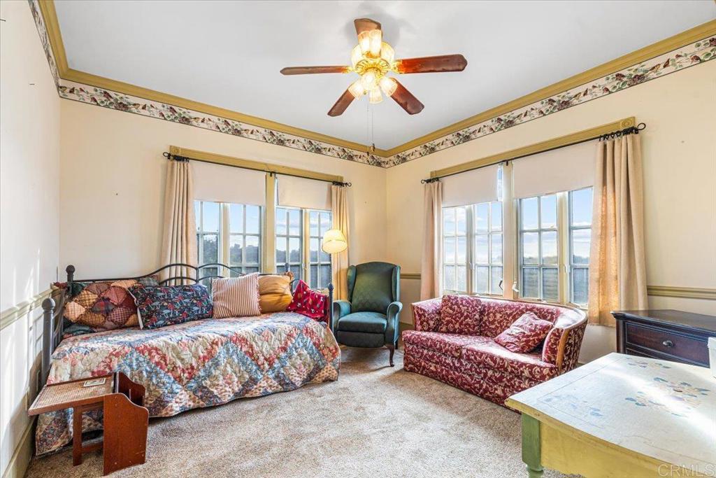 333 Salmon Road Ramona, CA 92065 - Photo 22 of 44 a bedroom with furniture and a large window