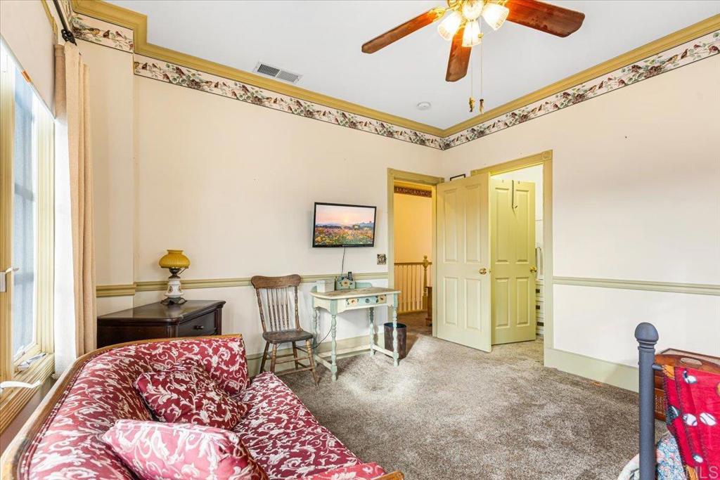 333 Salmon Road Ramona, CA 92065 - Photo 23 of 44 a bedroom with furniture and a window