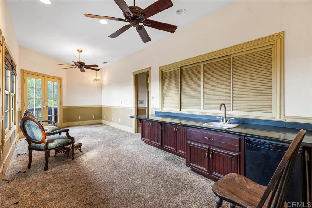 333 Salmon Road Ramona, CA 92065 - Photo 25 of 44 a spacious bathroom with a granite countertop sink a mirror and a bathtub