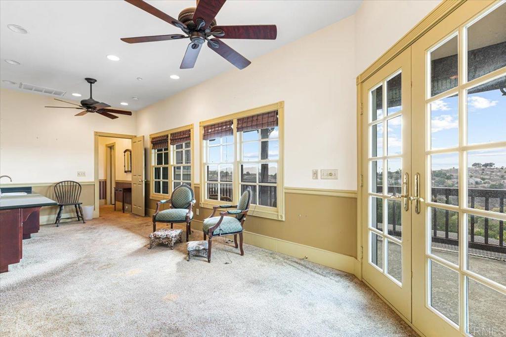 333 Salmon Road Ramona, CA 92065 - Photo 26 of 44 a living room with furniture and a large window