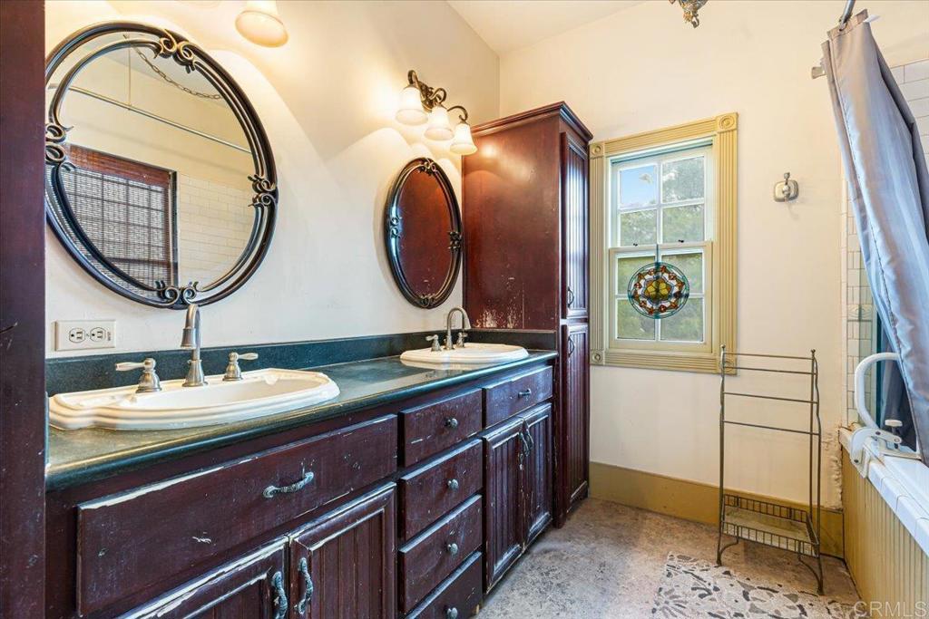 333 Salmon Road Ramona, CA 92065 - Photo 28 of 44 a bathroom with a sink and a mirror