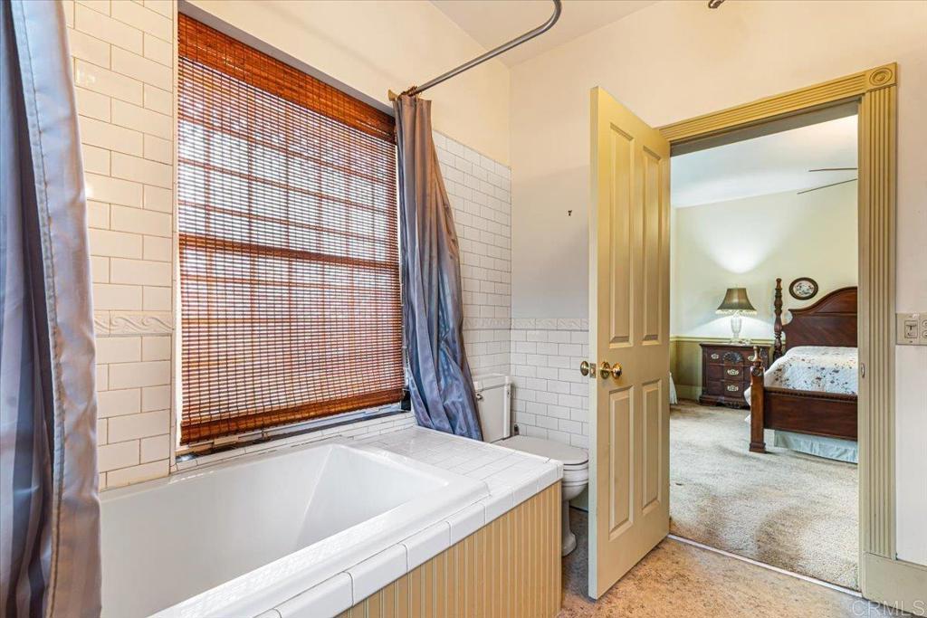 333 Salmon Road Ramona, CA 92065 - Photo 29 of 44 a bathroom with a tub and shower