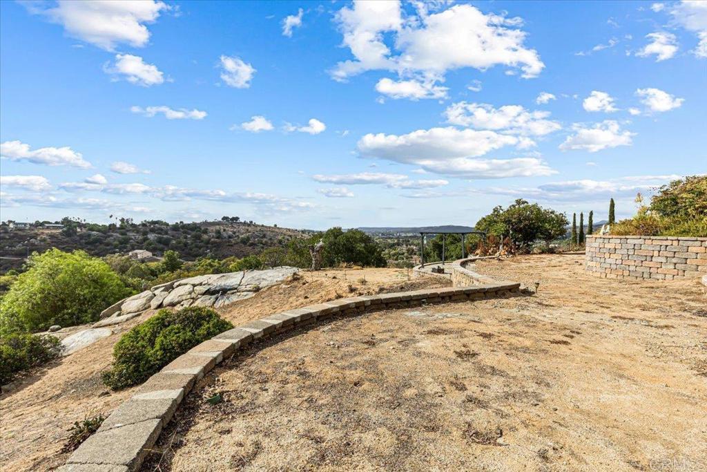 333 Salmon Road Ramona, CA 92065 - Photo 42 of 44 a view of a yard with an outdoor space