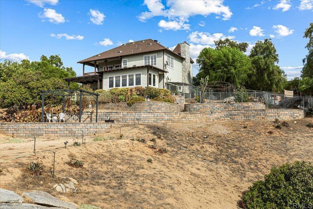 333 Salmon Road Ramona, CA 92065 - Photo 43 of 44 a front view of a house with a yard