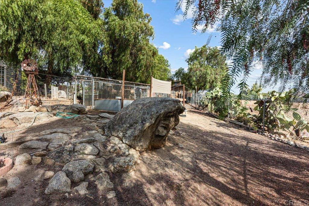 333 Salmon Road Ramona, CA 92065 - Photo 44 of 44 a view of a yard with wooden fence