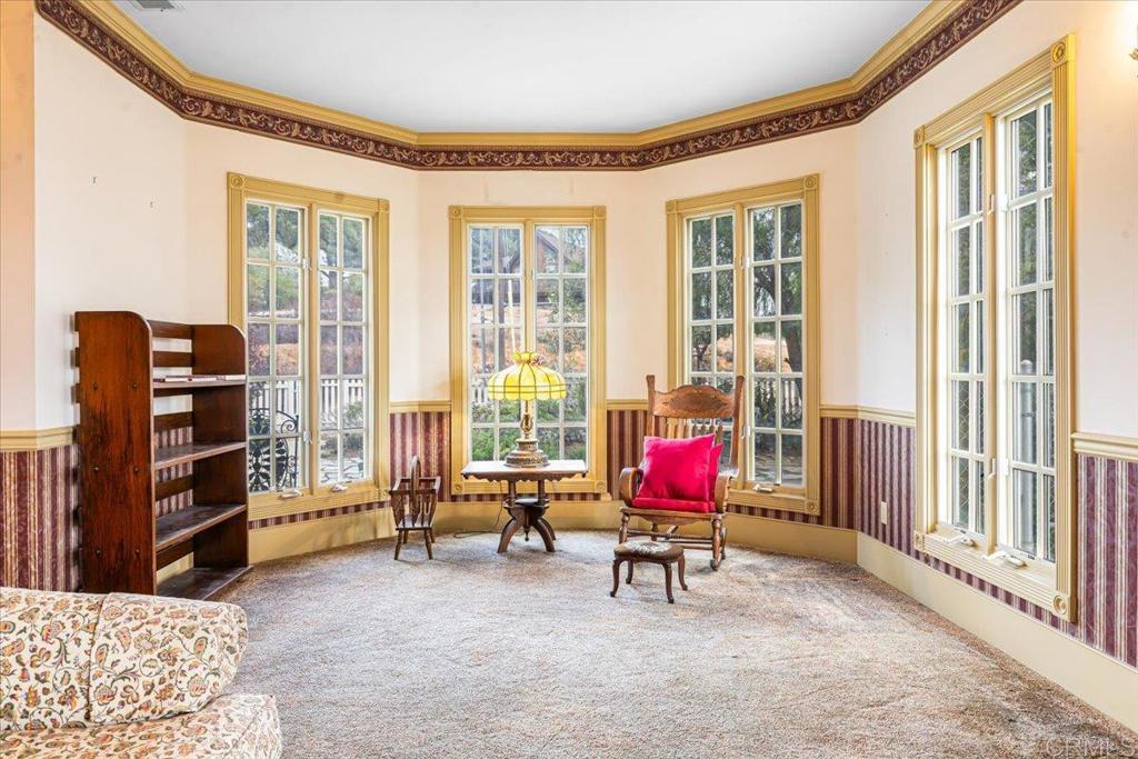 333 Salmon Road Ramona, CA 92065 - Photo 8 of 44 a living room with furniture and floor to ceiling window