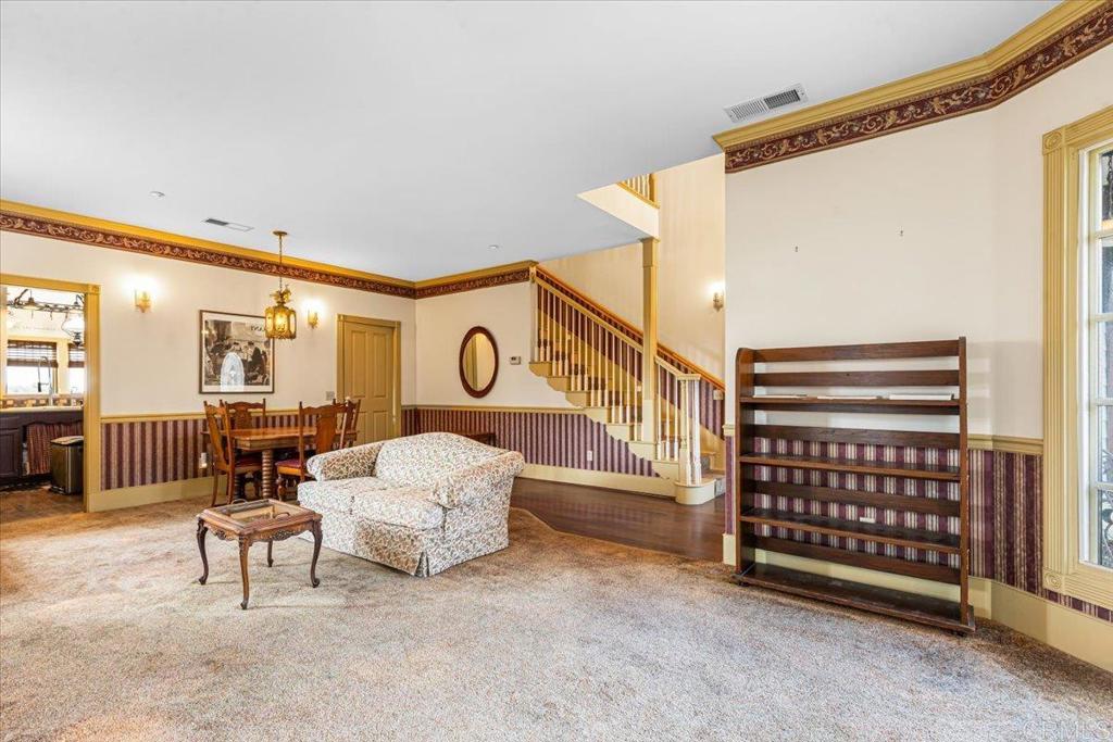 333 Salmon Road Ramona, CA 92065 - Photo 9 of 44 a spacious bedroom with a bed a table and chair