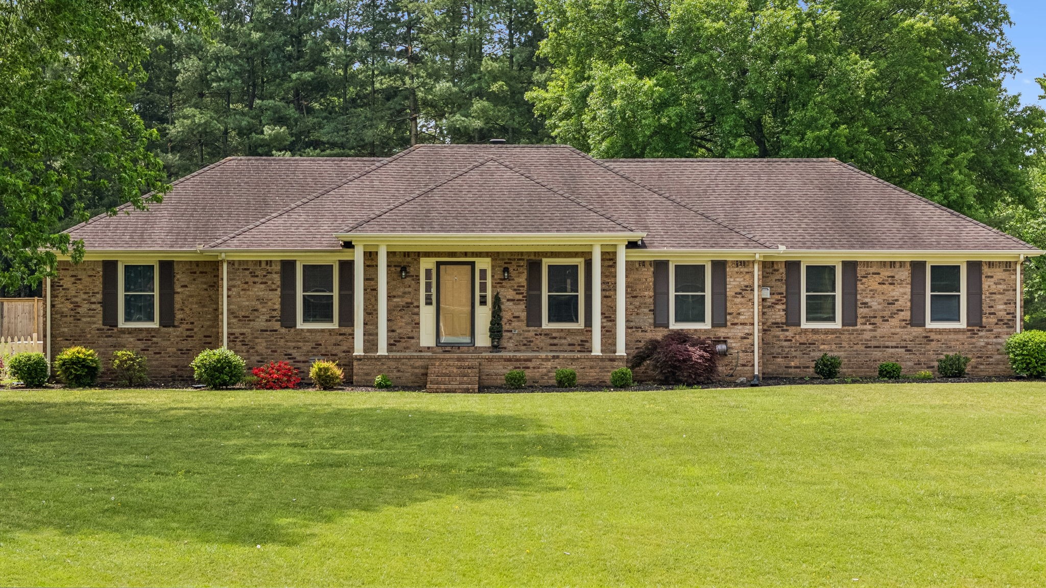 2104 Red Mile Road Murfreesboro, TN 37127 - Photo 1 of 28 a front view of a house with a garden and garden