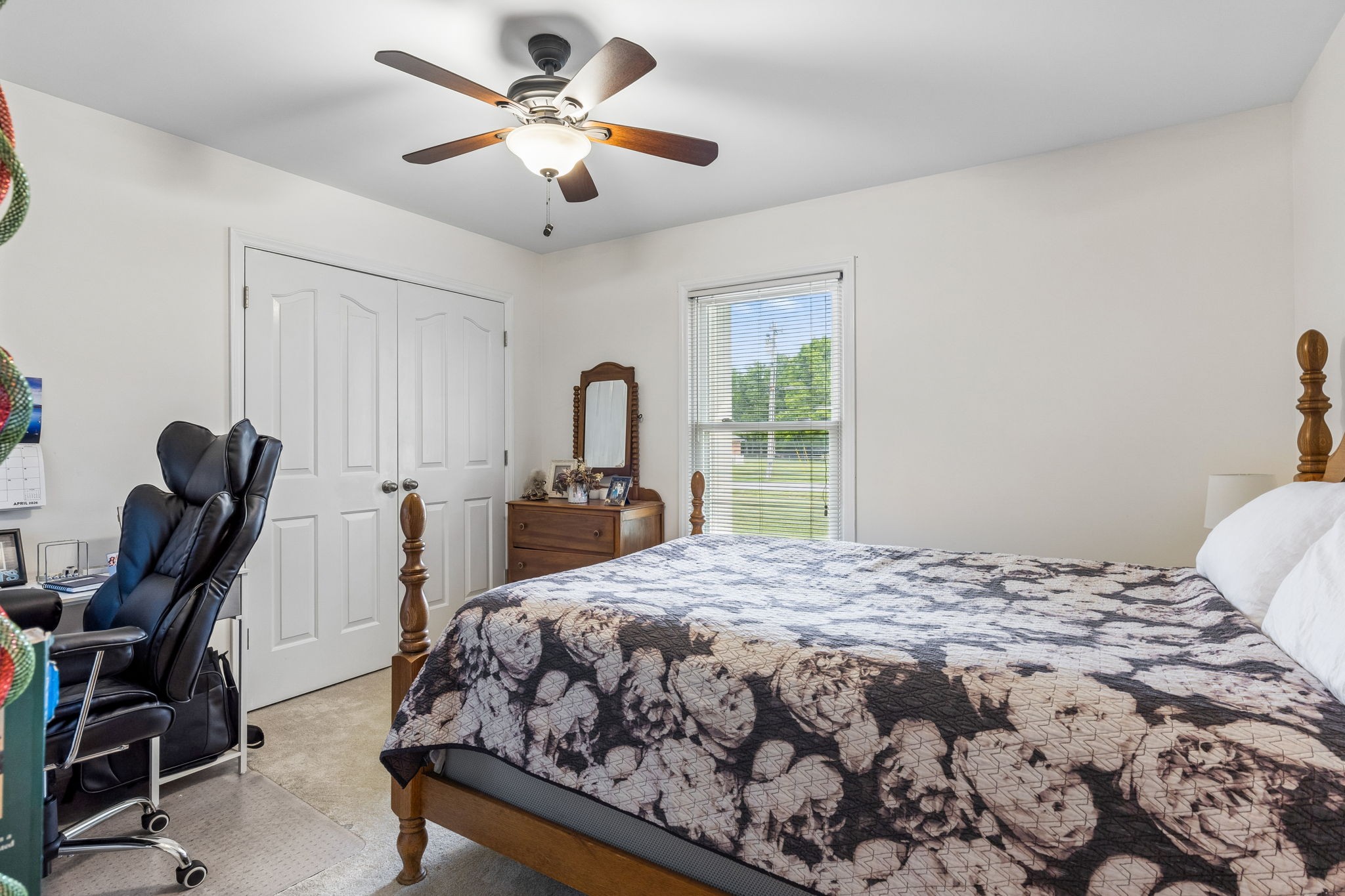 2104 Red Mile Road Murfreesboro, TN 37127 - Photo 18 of 28 a bedroom with a bed and a chandelier