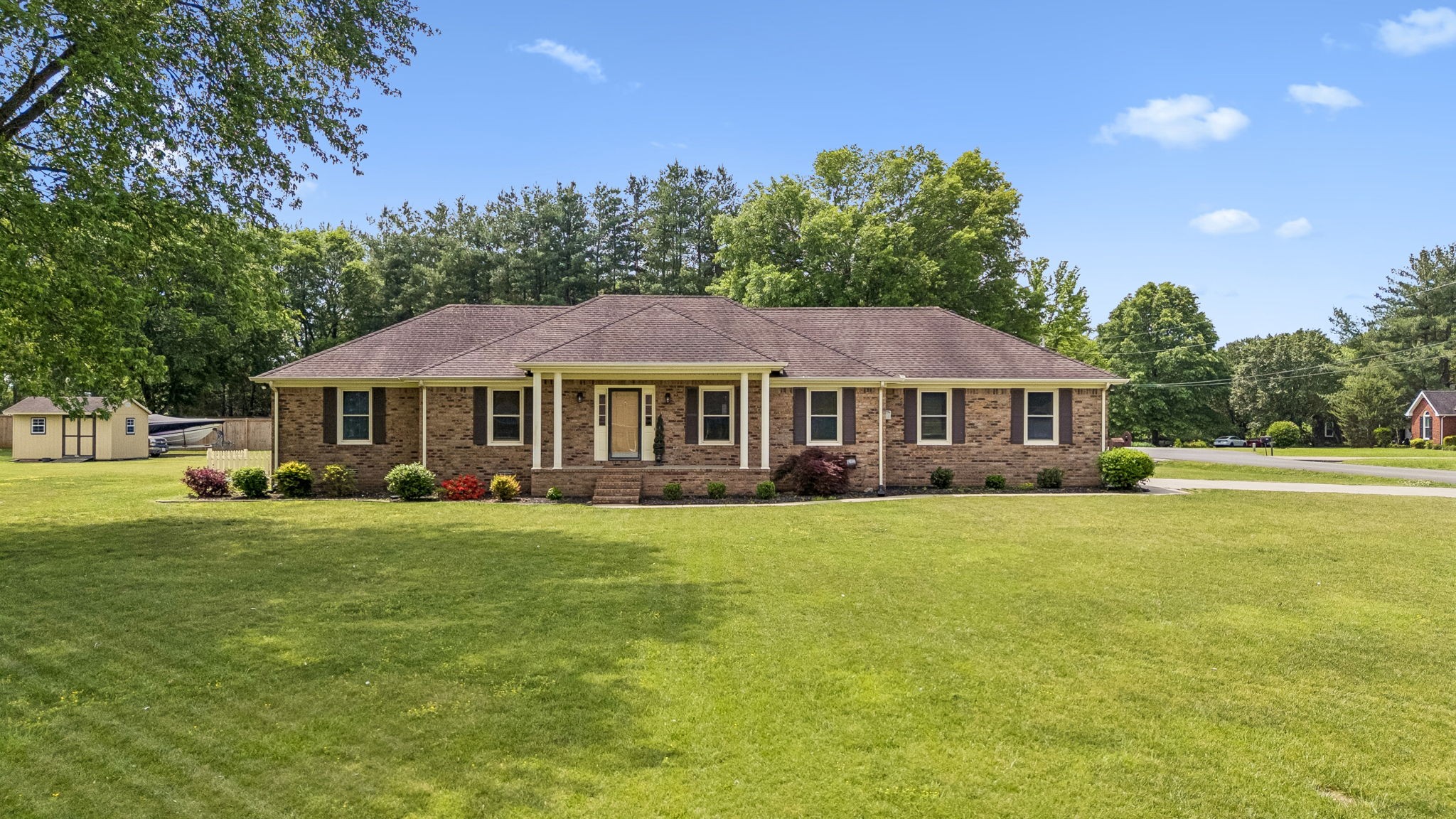 2104 Red Mile Road Murfreesboro, TN 37127 - Photo 2 of 28 a front view of a house with garden