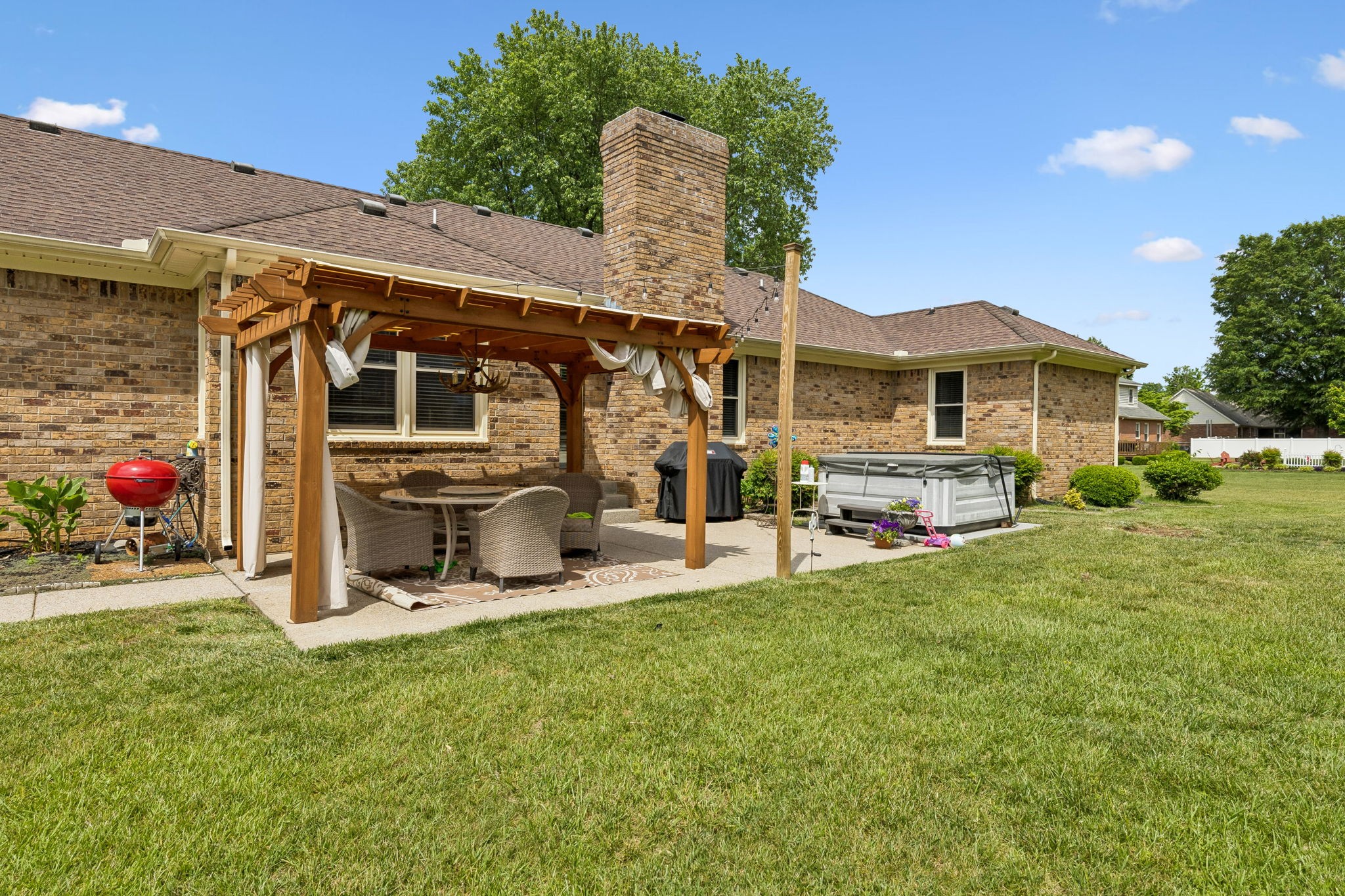 2104 Red Mile Road Murfreesboro, TN 37127 - Photo 21 of 28 a view of a house with a backyard and a patio