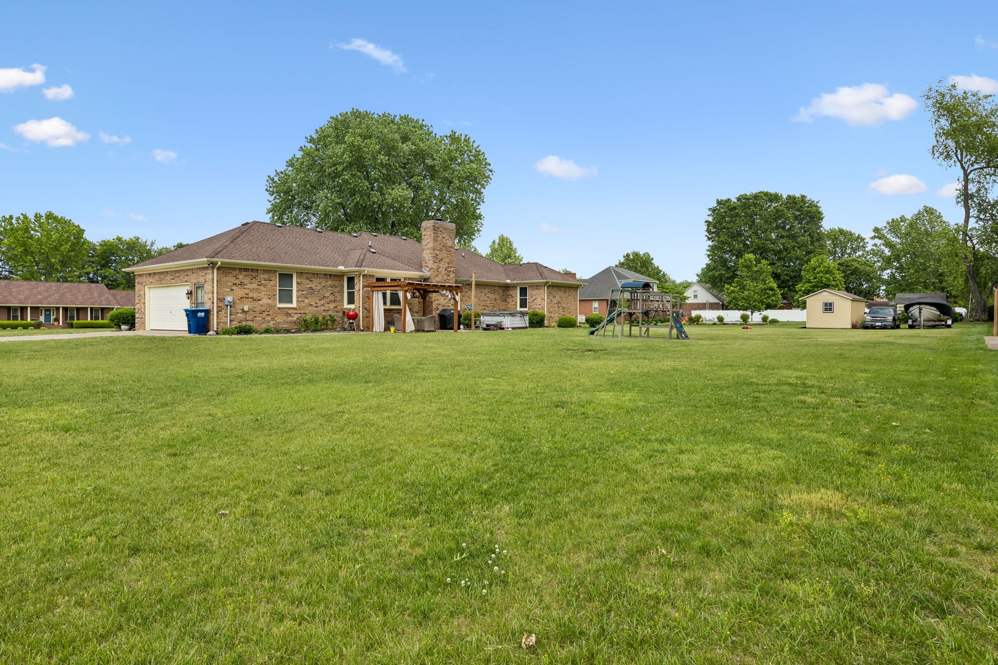 2104 Red Mile Road Murfreesboro, TN 37127 - Photo 26 of 28 a view of a house with a big yard and large trees