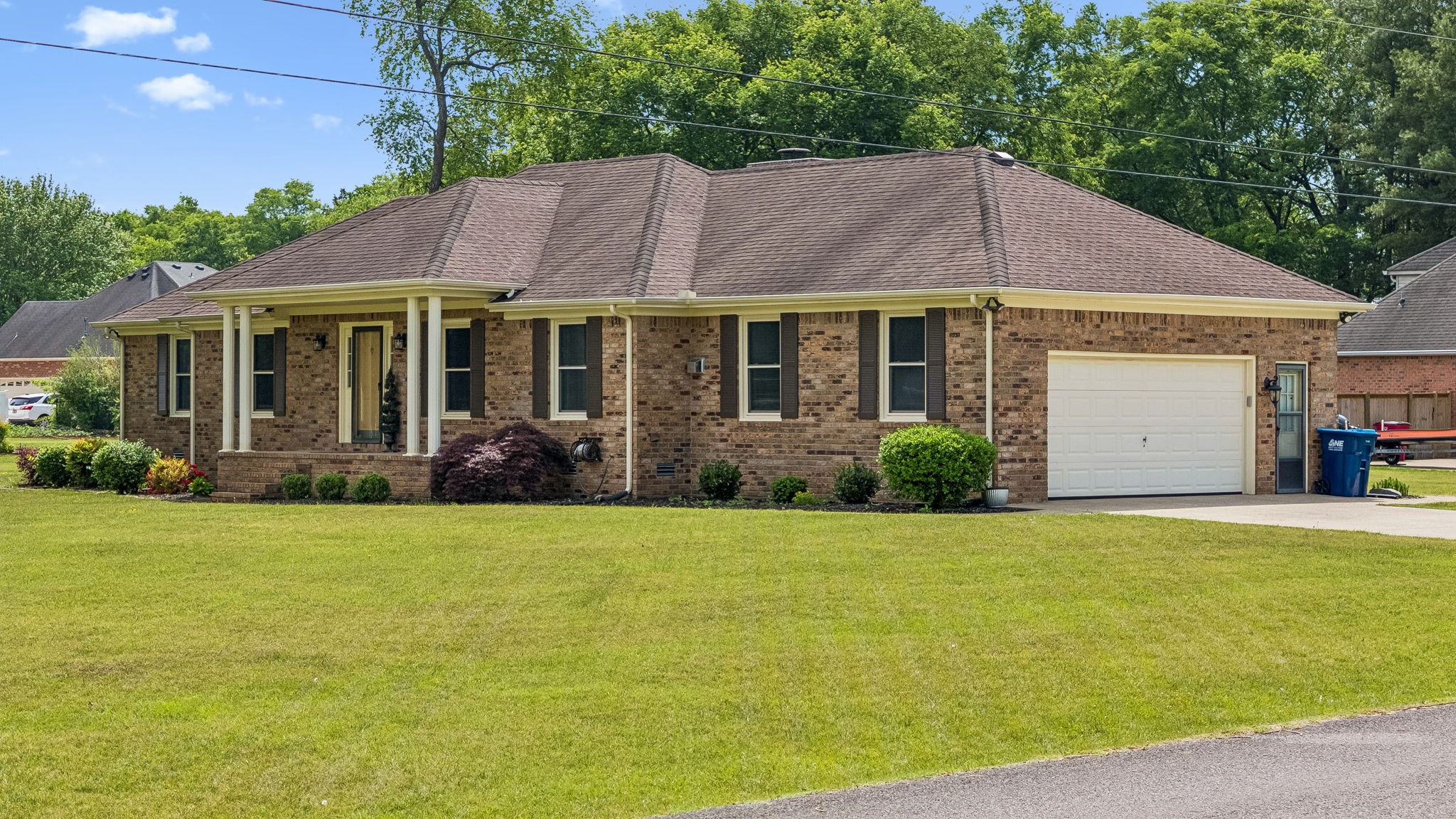 2104 Red Mile Road Murfreesboro, TN 37127 - Photo 28 of 28 a front view of a house with a garden