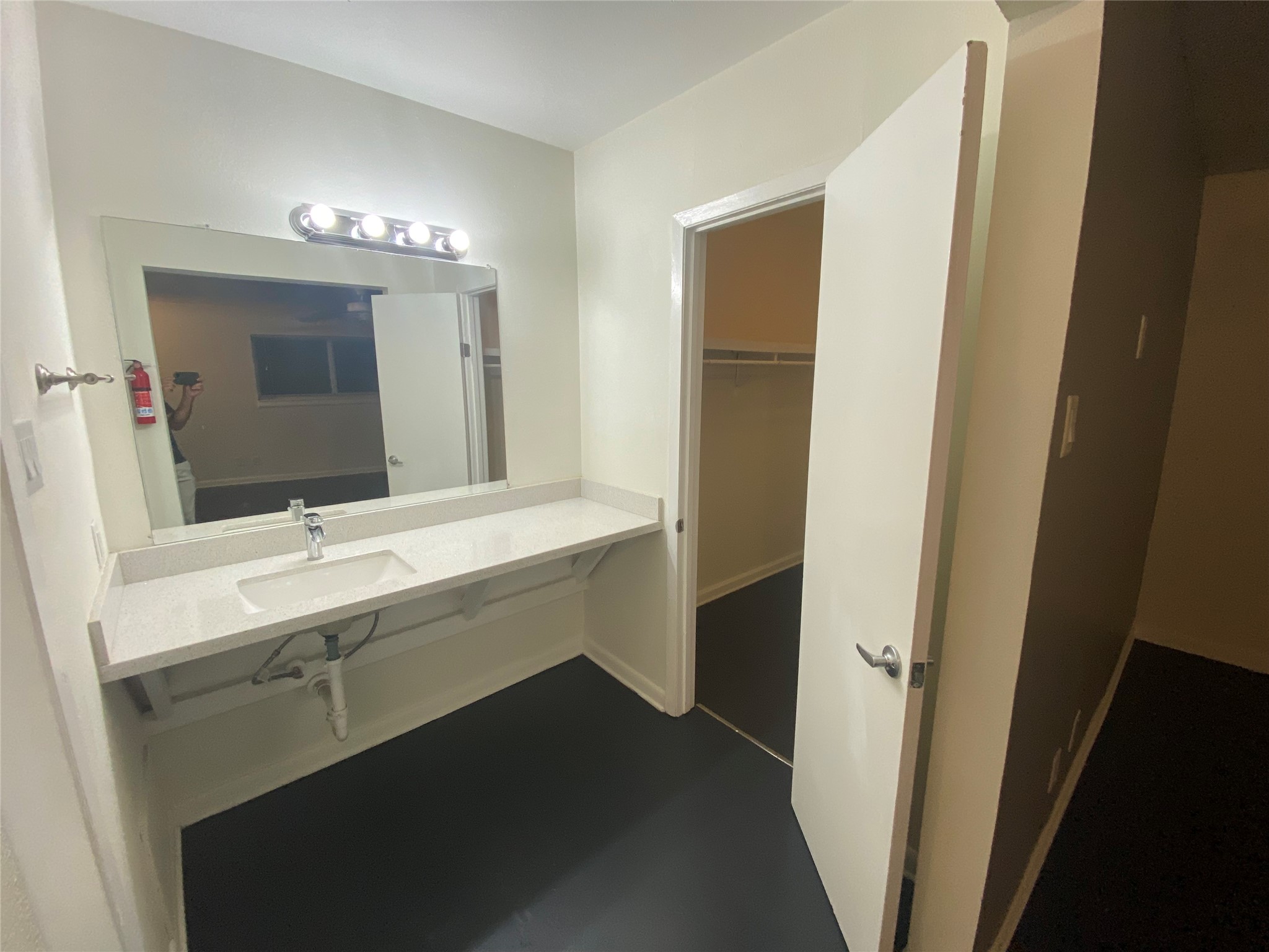 219 West Alabama Street, Unit 5 Houston, TX 77006 - Photo 5 of 10 a bathroom with a sink and a mirror