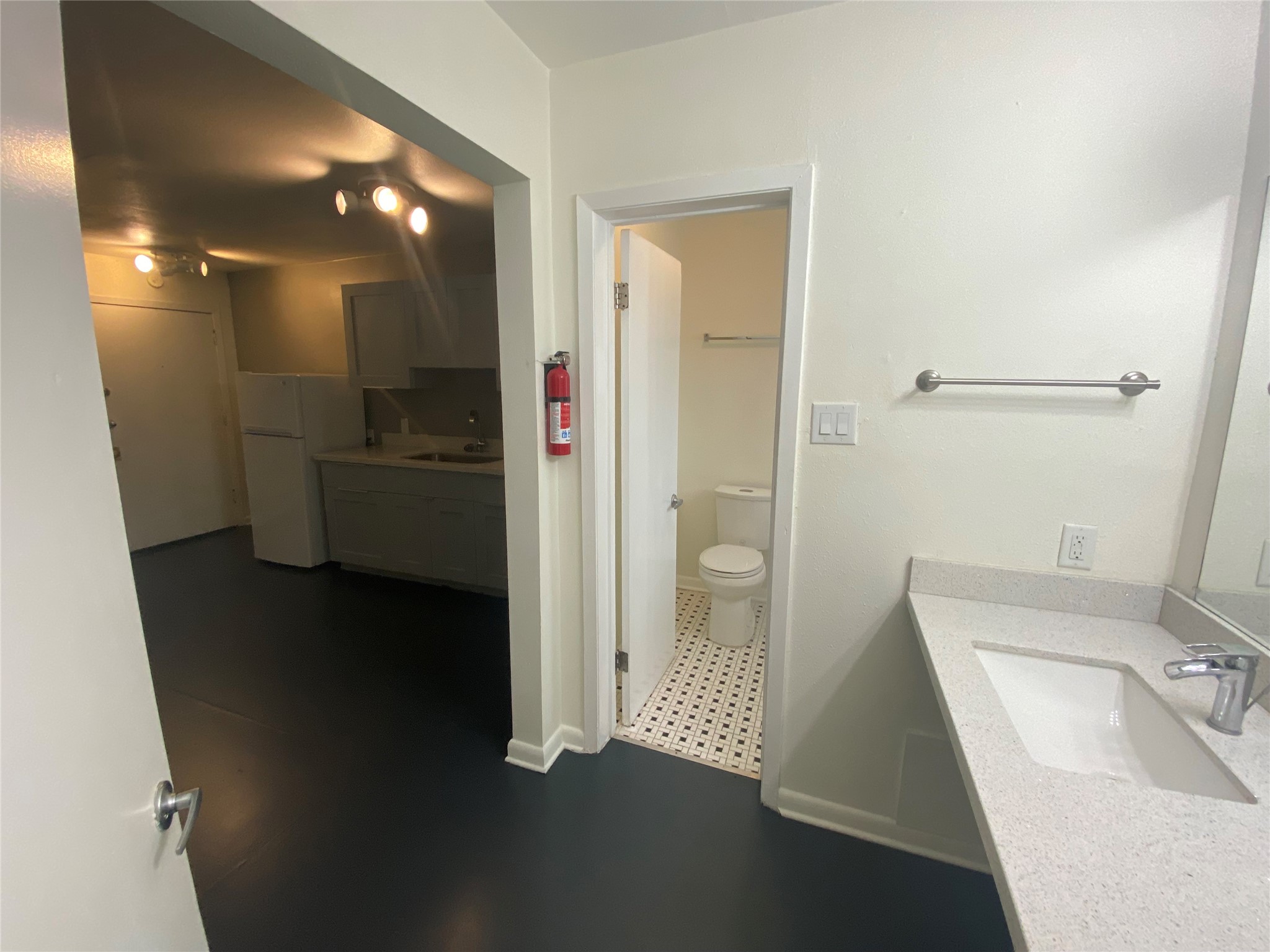 219 West Alabama Street, Unit 5 Houston, TX 77006 - Photo 8 of 10 a bathroom with a sink and a mirror