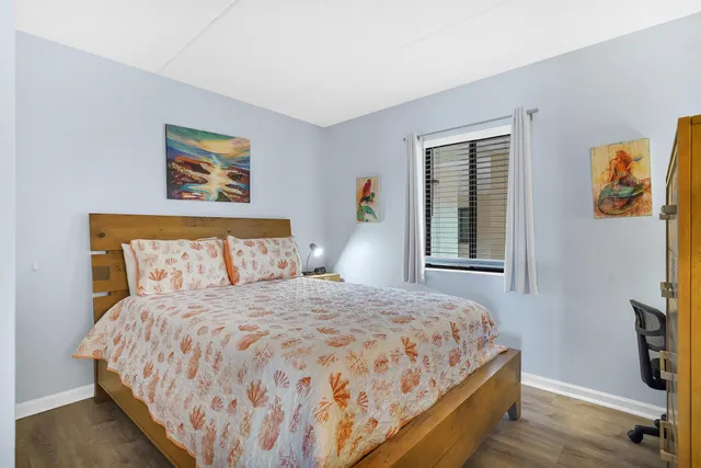 a bathroom with a sink mirror toilet and bathtub