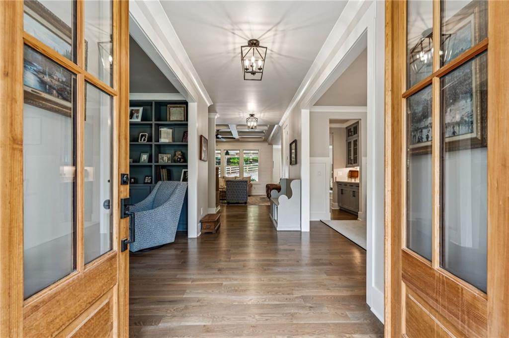 6326 Point Twenty Two Gainesville, GA 30506 - Photo 11 of 92 a view of a hallway view with living room and wooden floor