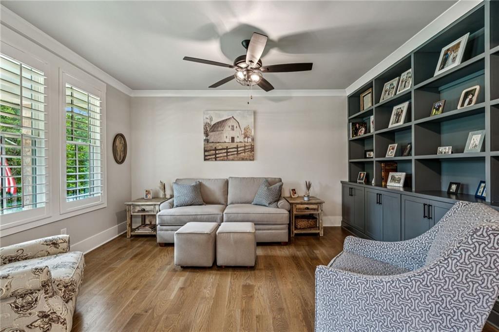 6326 Point Twenty Two Gainesville, GA 30506 - Photo 12 of 92 a living room with furniture and a book shelf
