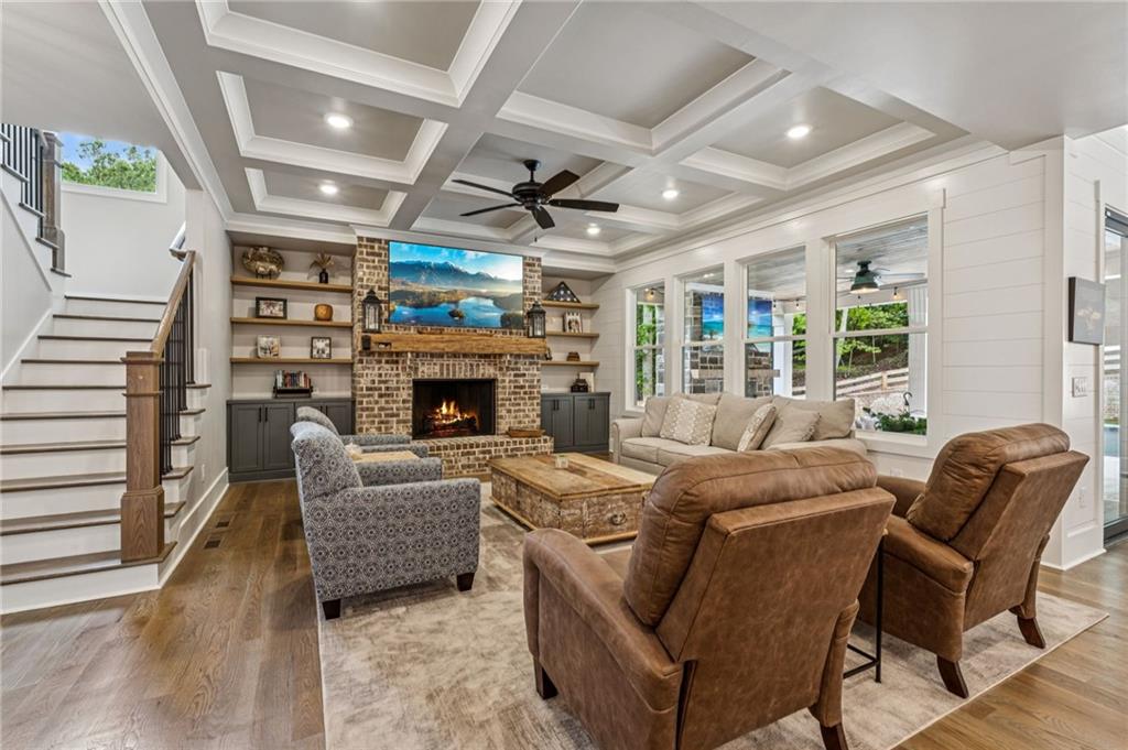 6326 Point Twenty Two Gainesville, GA 30506 - Photo 16 of 92 a living room with furniture and a fireplace