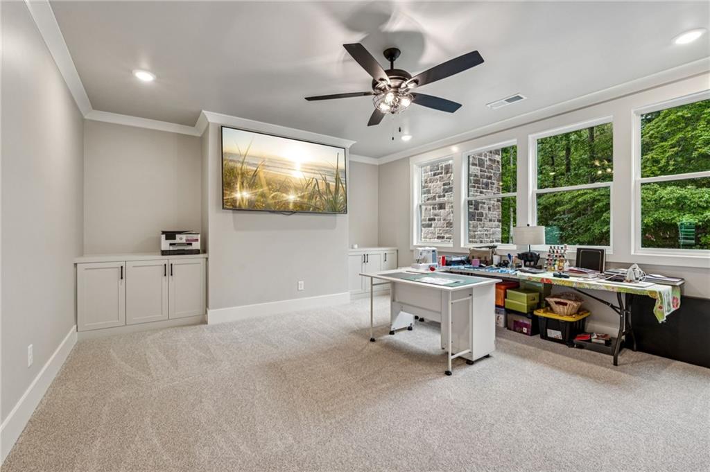 6326 Point Twenty Two Gainesville, GA 30506 - Photo 34 of 92 a view of a workspace with furniture and a window