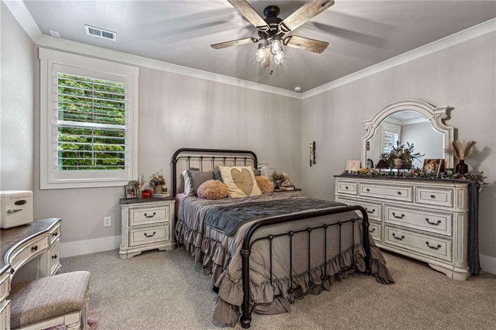 6326 Point Twenty Two Gainesville, GA 30506 - Photo 40 of 92 a bedroom with a bed and a dresser