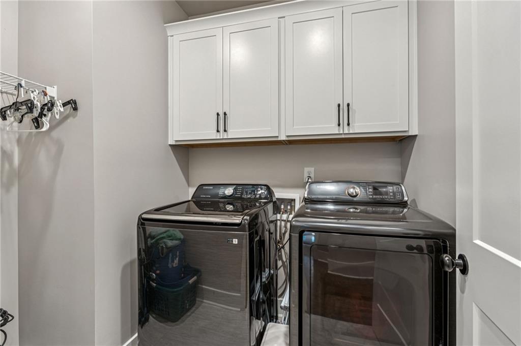 6326 Point Twenty Two Gainesville, GA 30506 - Photo 46 of 92 a kitchen with a stove and a sink
