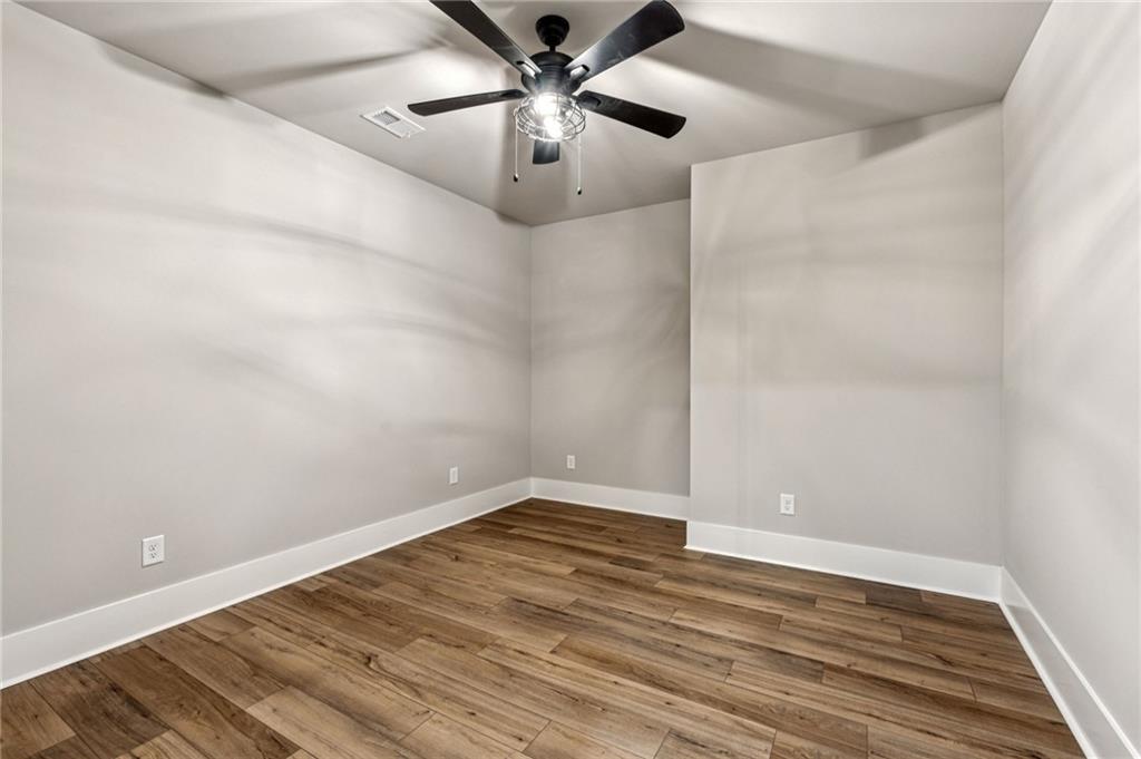 6326 Point Twenty Two Gainesville, GA 30506 - Photo 53 of 92 wooden floor in an empty room