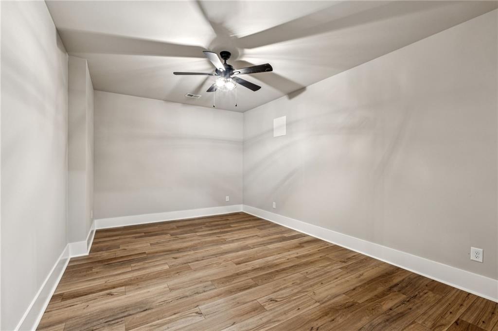 6326 Point Twenty Two Gainesville, GA 30506 - Photo 54 of 92 wooden floor in an empty room
