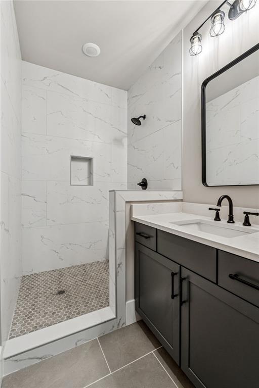 6326 Point Twenty Two Gainesville, GA 30506 - Photo 55 of 92 a bathroom with a sink and a mirror