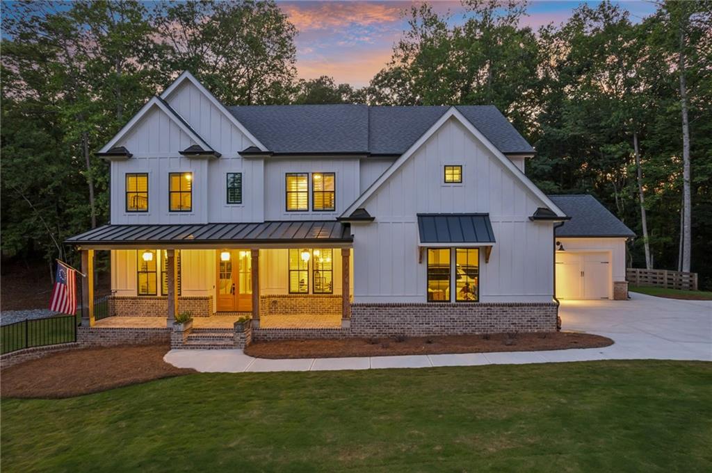6326 Point Twenty Two Gainesville, GA 30506 - Photo 68 of 92 a front view of house with yard and green space
