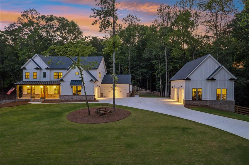 6326 Point Twenty Two Gainesville, GA 30506 - Photo 69 of 92 a front view of house with yard and green space