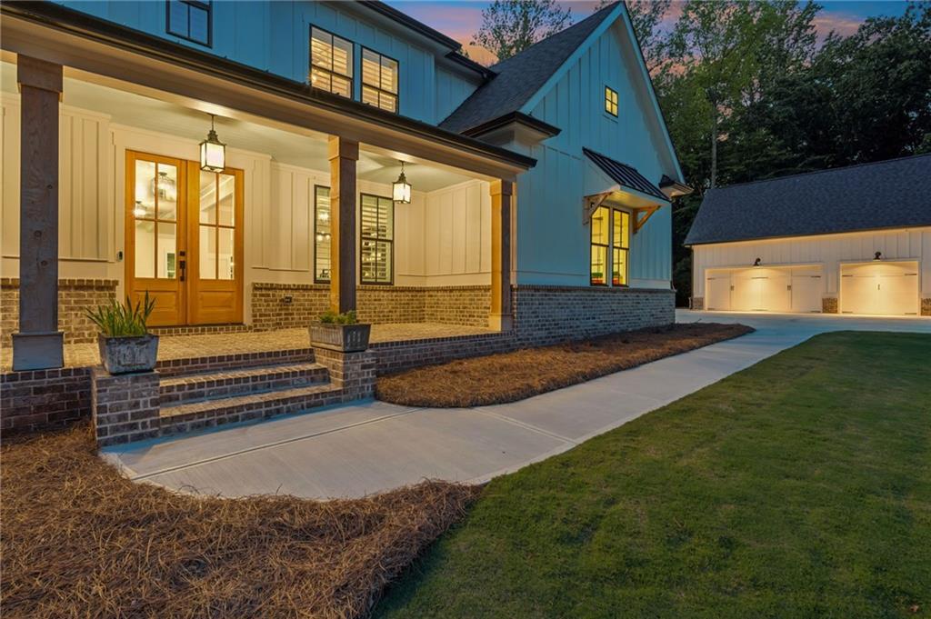 6326 Point Twenty Two Gainesville, GA 30506 - Photo 73 of 92 a view of an house with backyard porch and wooden floor