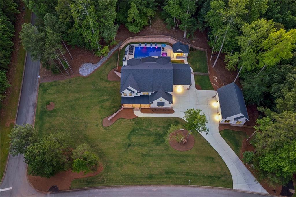 6326 Point Twenty Two Gainesville, GA 30506 - Photo 81 of 92 an aerial view of a house with garden space sitting space and swimming pool